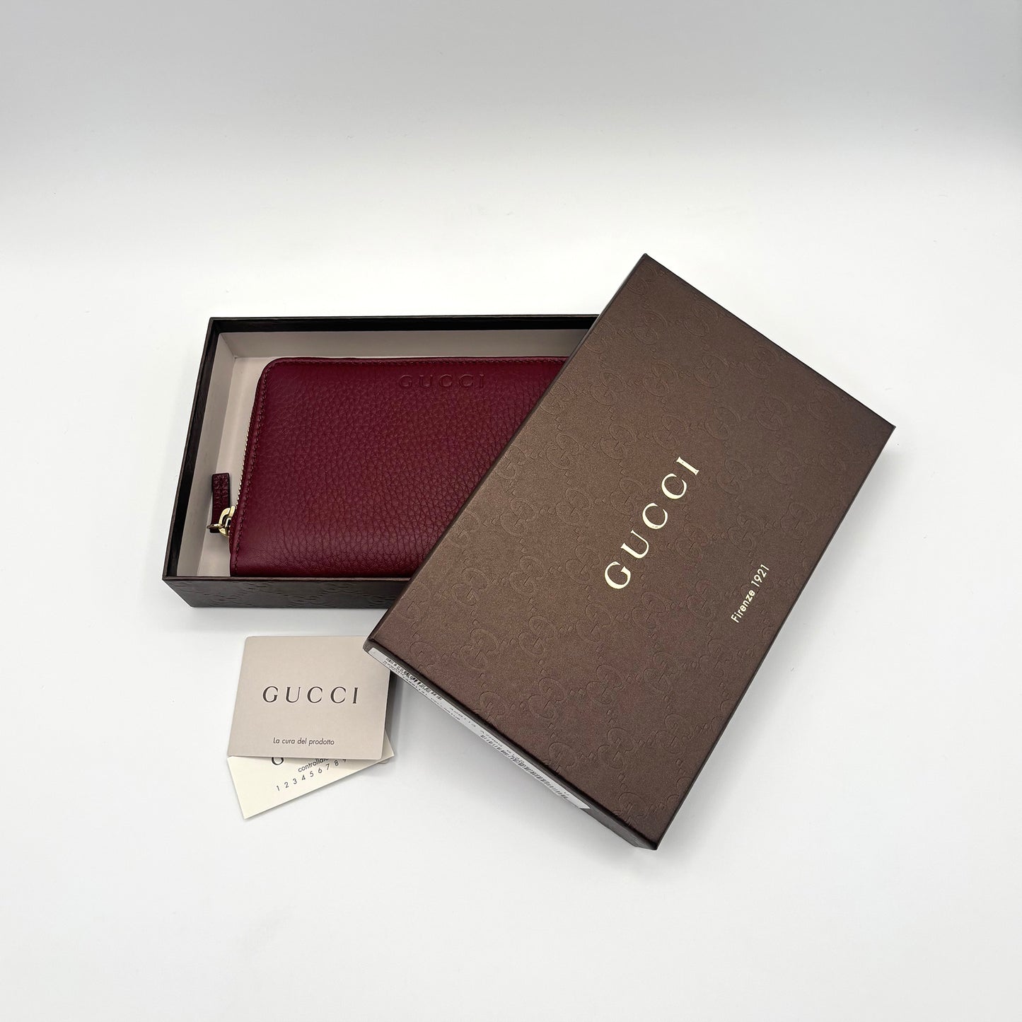 GUCCI Maroon Pebbled Leather Zip-Around Bi-Fold